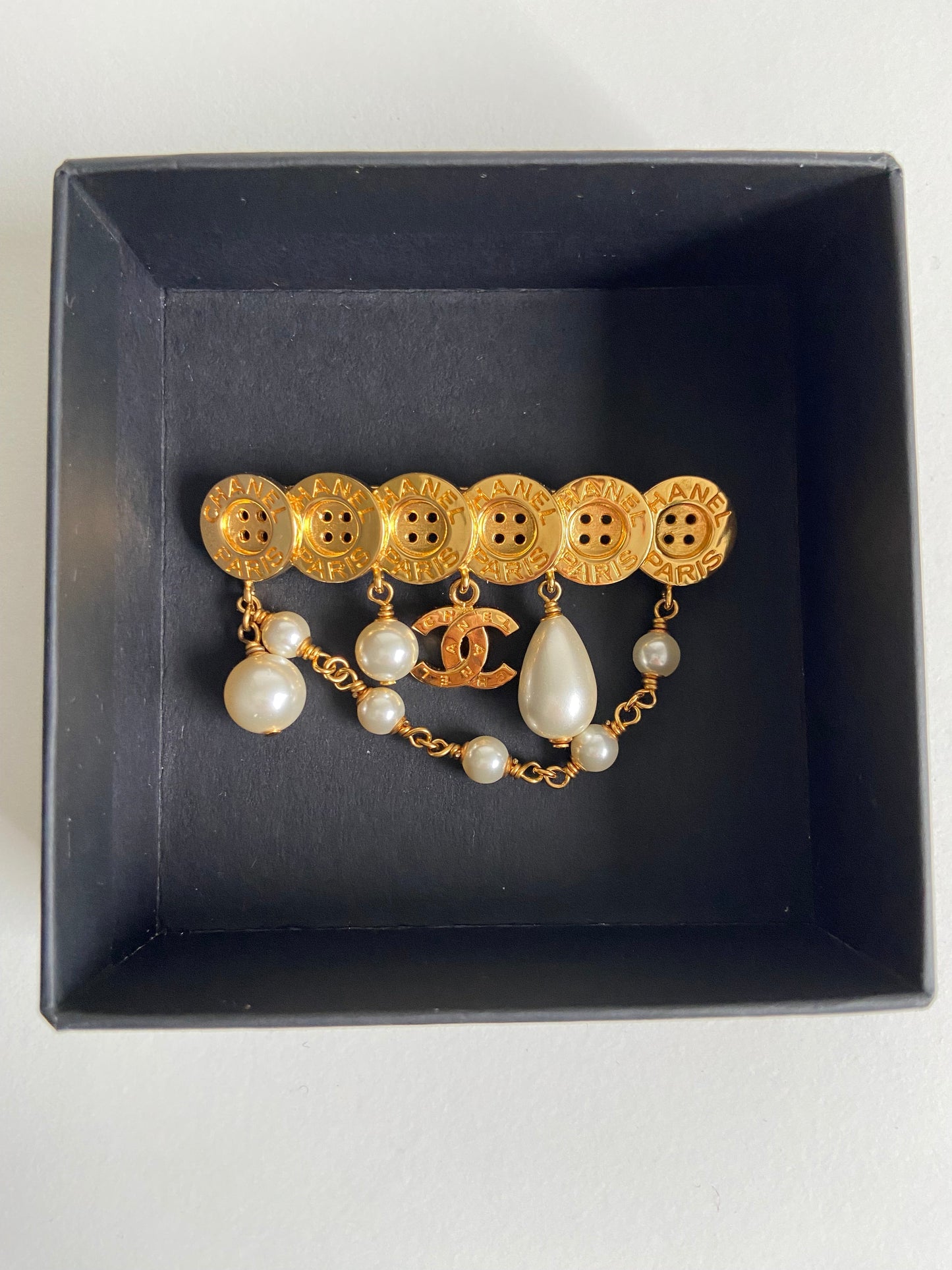 chanel button & pearls brooch