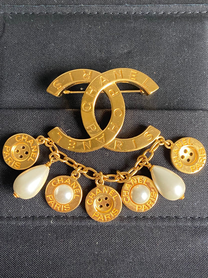 CHANEL CC AND BUTTON BROOCH