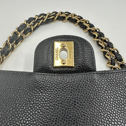 Timeless medium cuir caviar noir et or