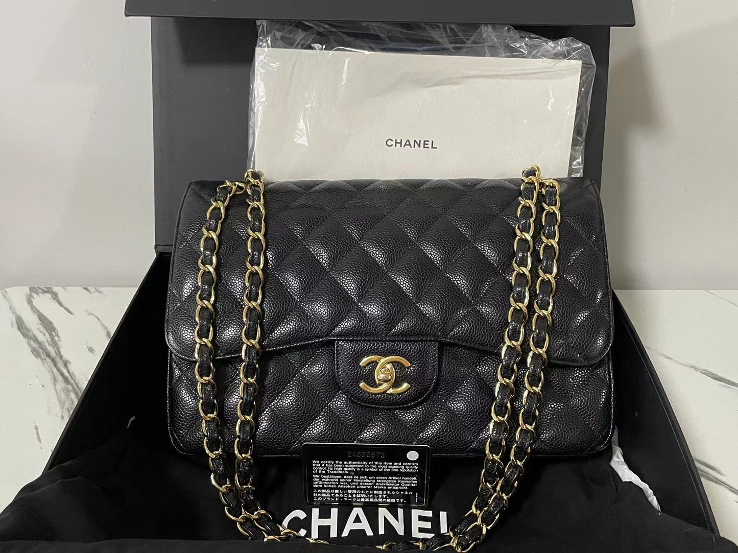 Chanel Black Jumbo Classic Double Flap Bag Caviar Leather with Gold Hardware