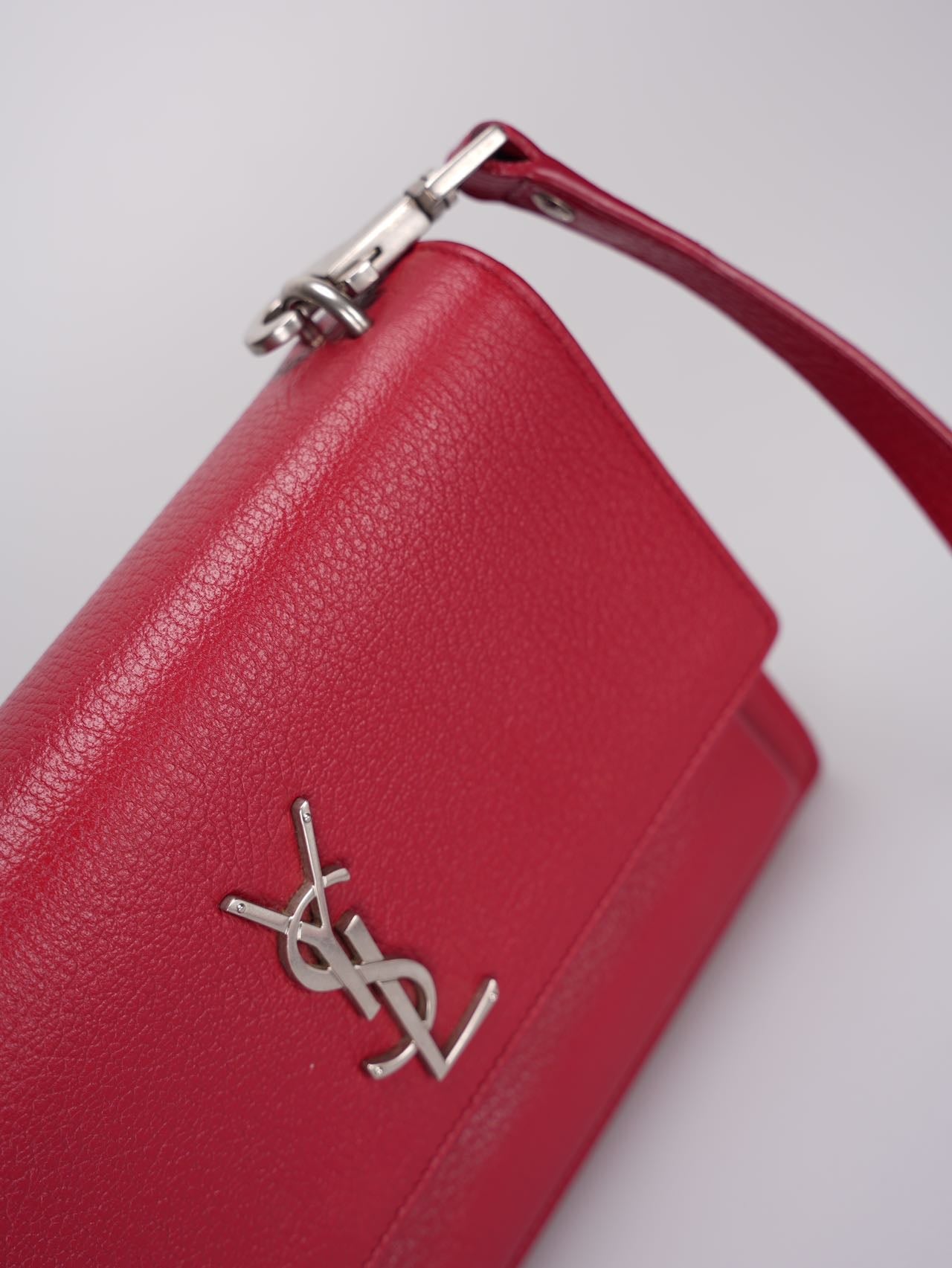 Saint Laurent Grained Calfskin Medium Monogram Sunset  bag in Red