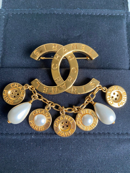 CHANEL CC AND BUTTON BROOCH