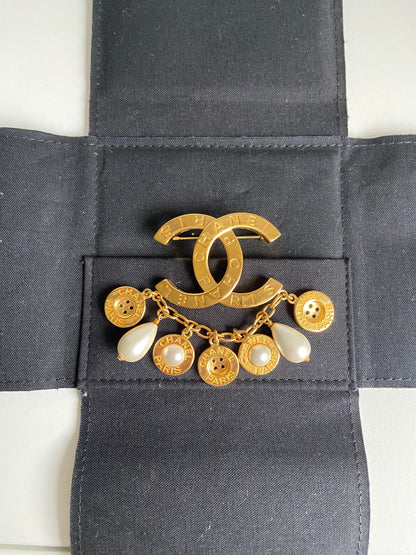 CHANEL CC AND BUTTON BROOCH