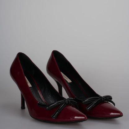 Prada Burgundy Patent Pointed Toe Bow Pumps 40