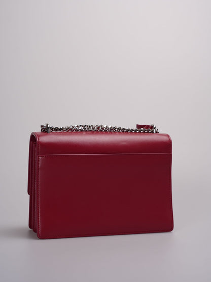 saint Laurent Calfskin Medium Monogram Sunset shoulder bag in Rouge