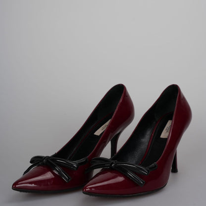 Prada Burgundy Patent Pointed Toe Bow Pumps 40